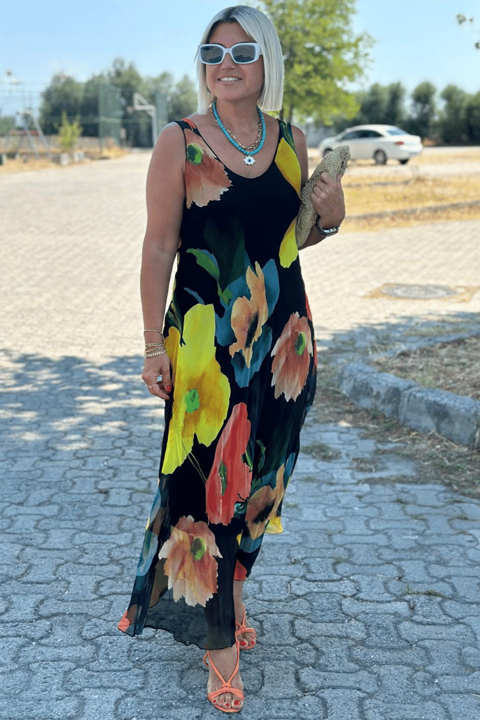 Maxi dress made of silk chiffon with a floral pattern and a U-shaped neckline