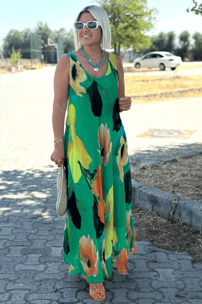 Maxi dress made of silk chiffon with a floral pattern and a U-shaped neckline