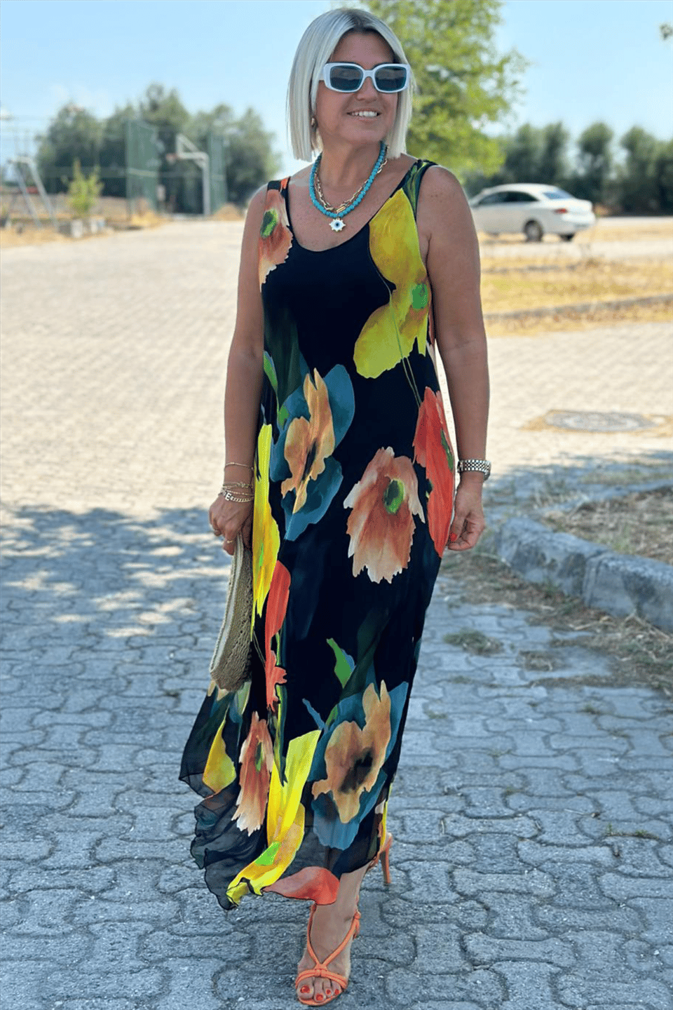 Maxi dress made of silk chiffon with a floral pattern and a U-shaped neckline